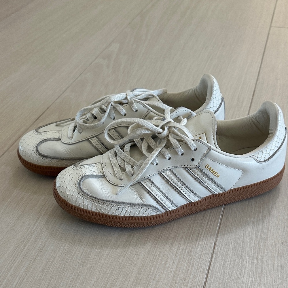 White and Brown Sneakers with Gold Accents